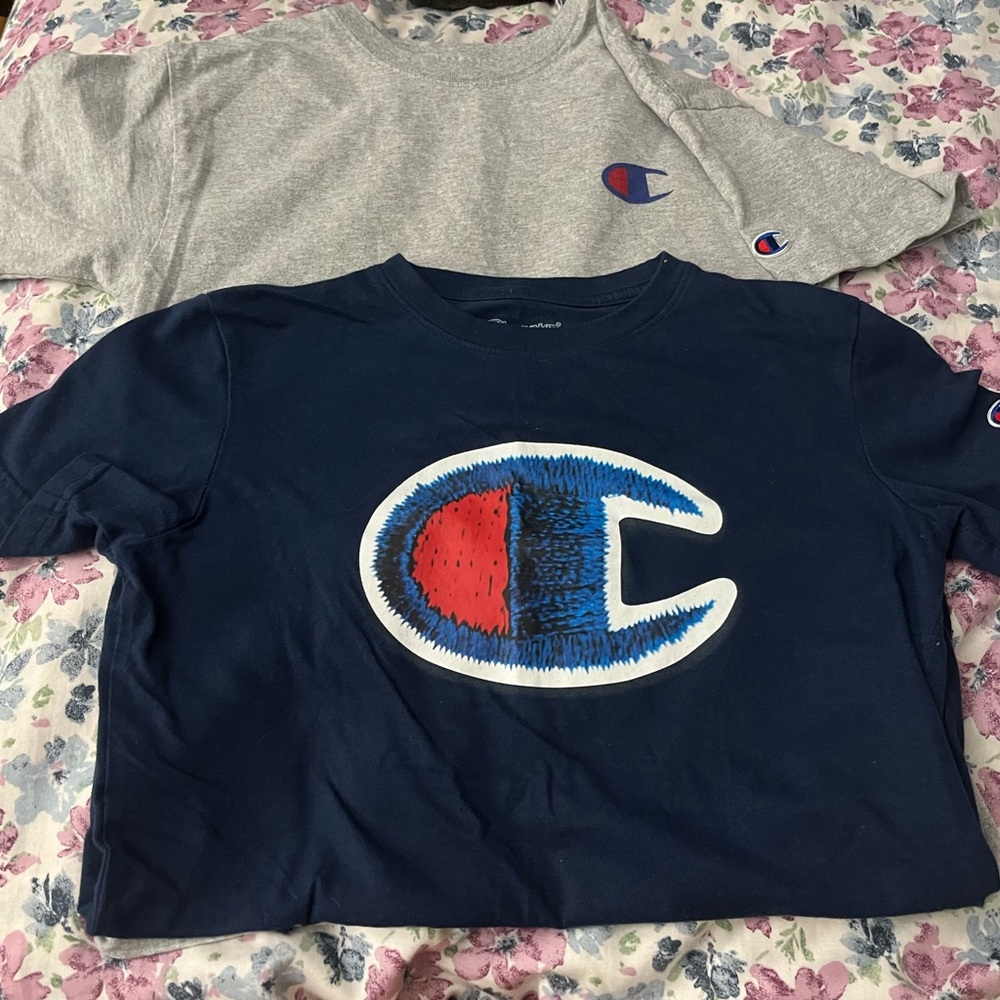 Champion shirts ; worn once; boys size YL